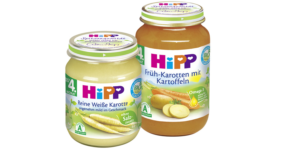 Two glass jars with labels, one with a white contents and the other with a brownish-orange contents, both labeled "HIPP" and "4 Monat" (4 months).